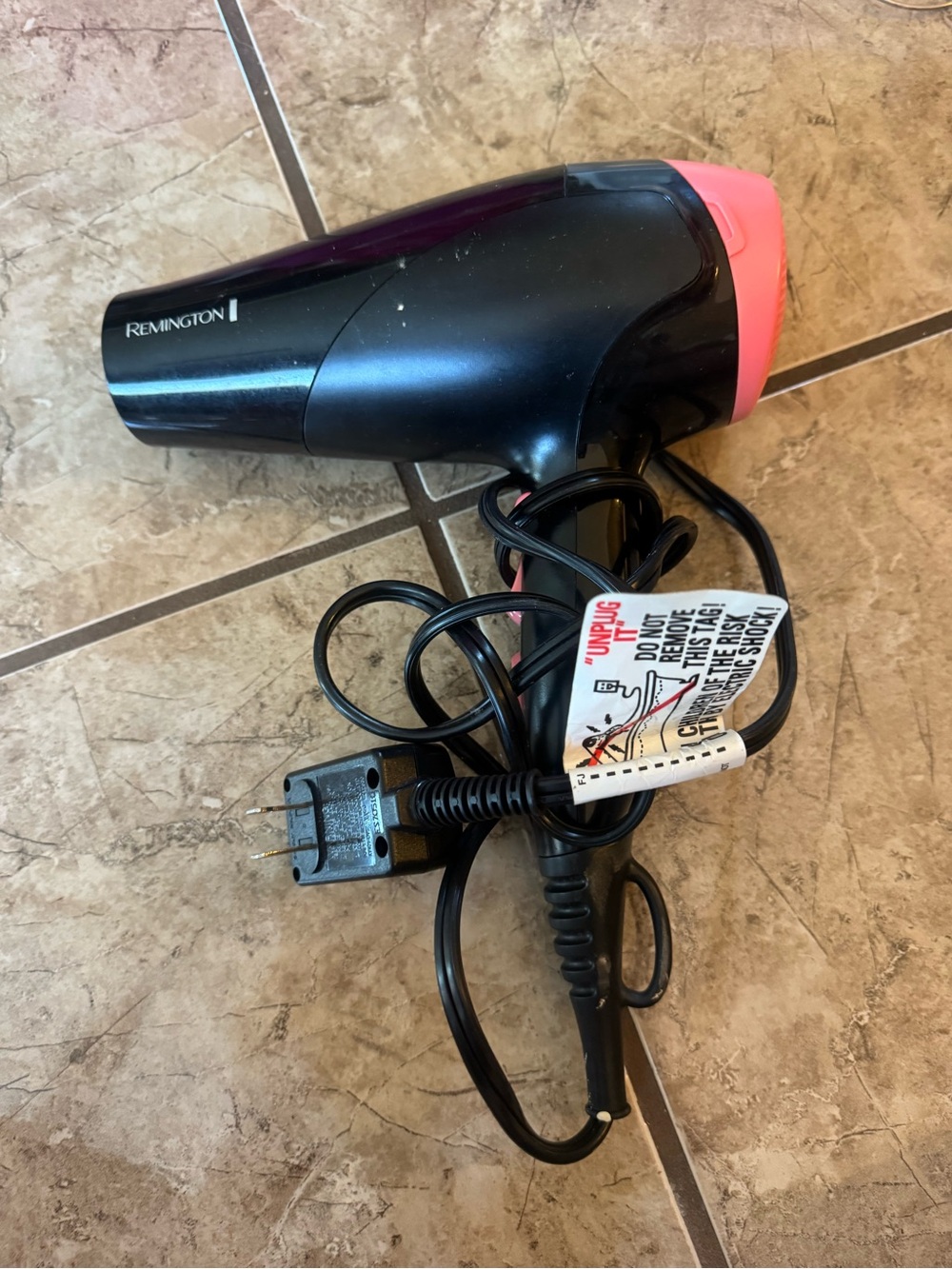 Remington Small Travel Hair Dryer in Black and Pink Accents